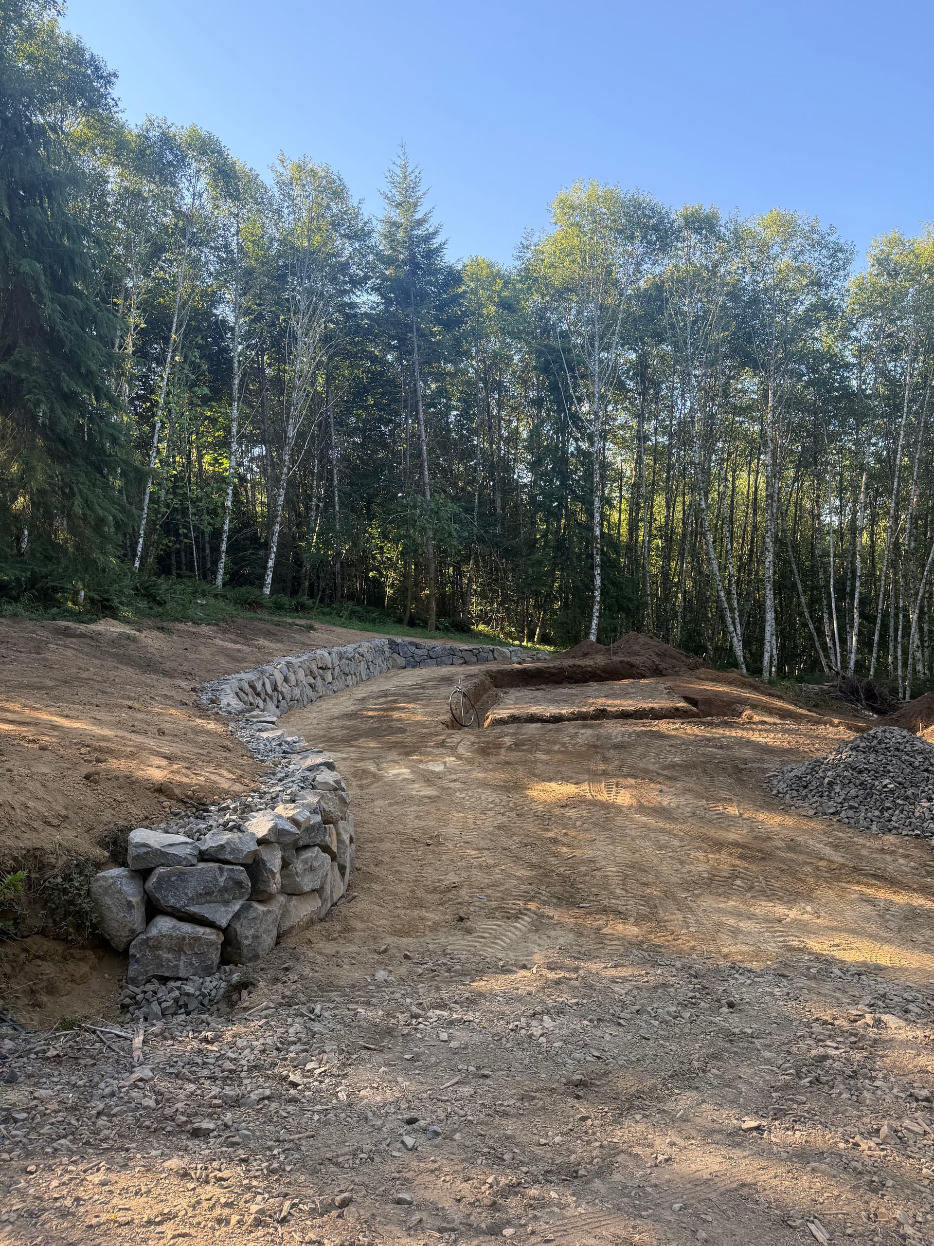 Retaining Wall, House Digout and Full Site Prep Done Right image