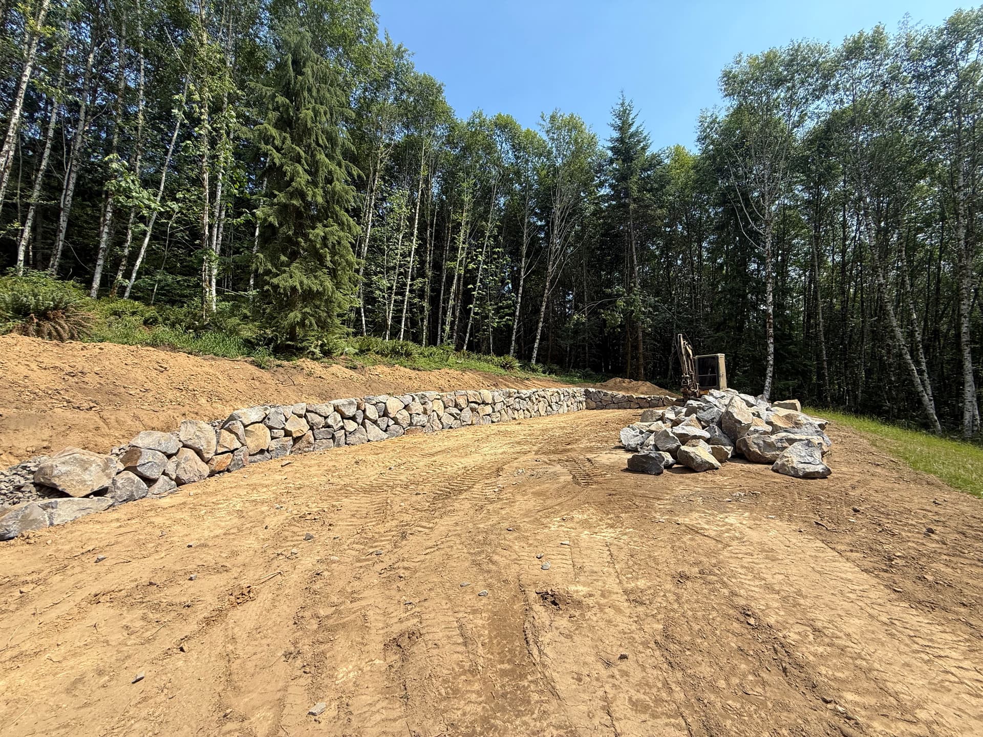 Boulder Retaining Wall Built Right From the Ground Up image