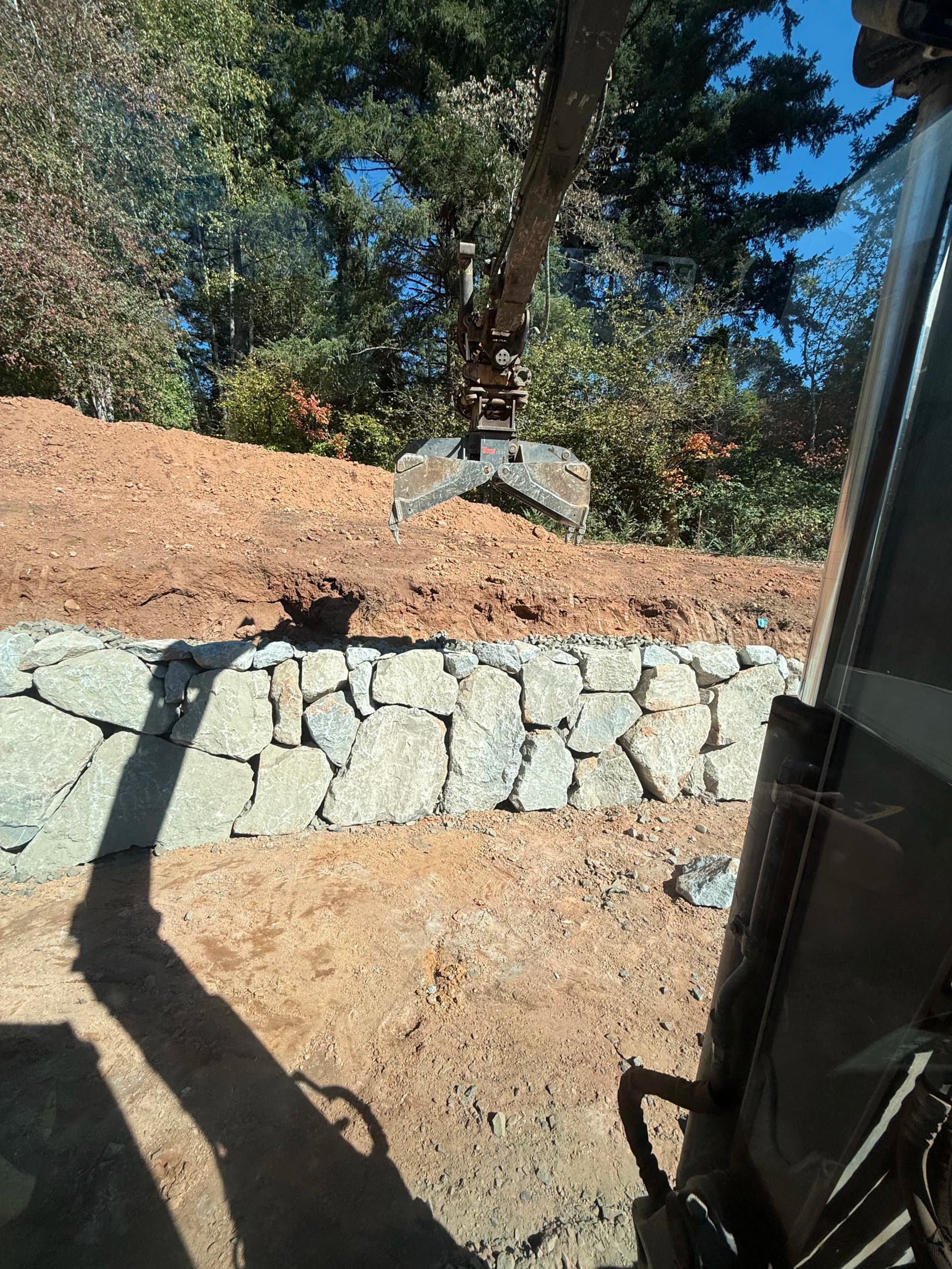 Natural Stone Retaining Wall Built the Right Way image